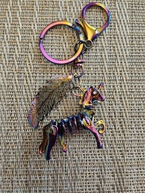 Hand Crafted Iridescent Oil Slick Unicorn Skeleton Keychain with Feather Charm